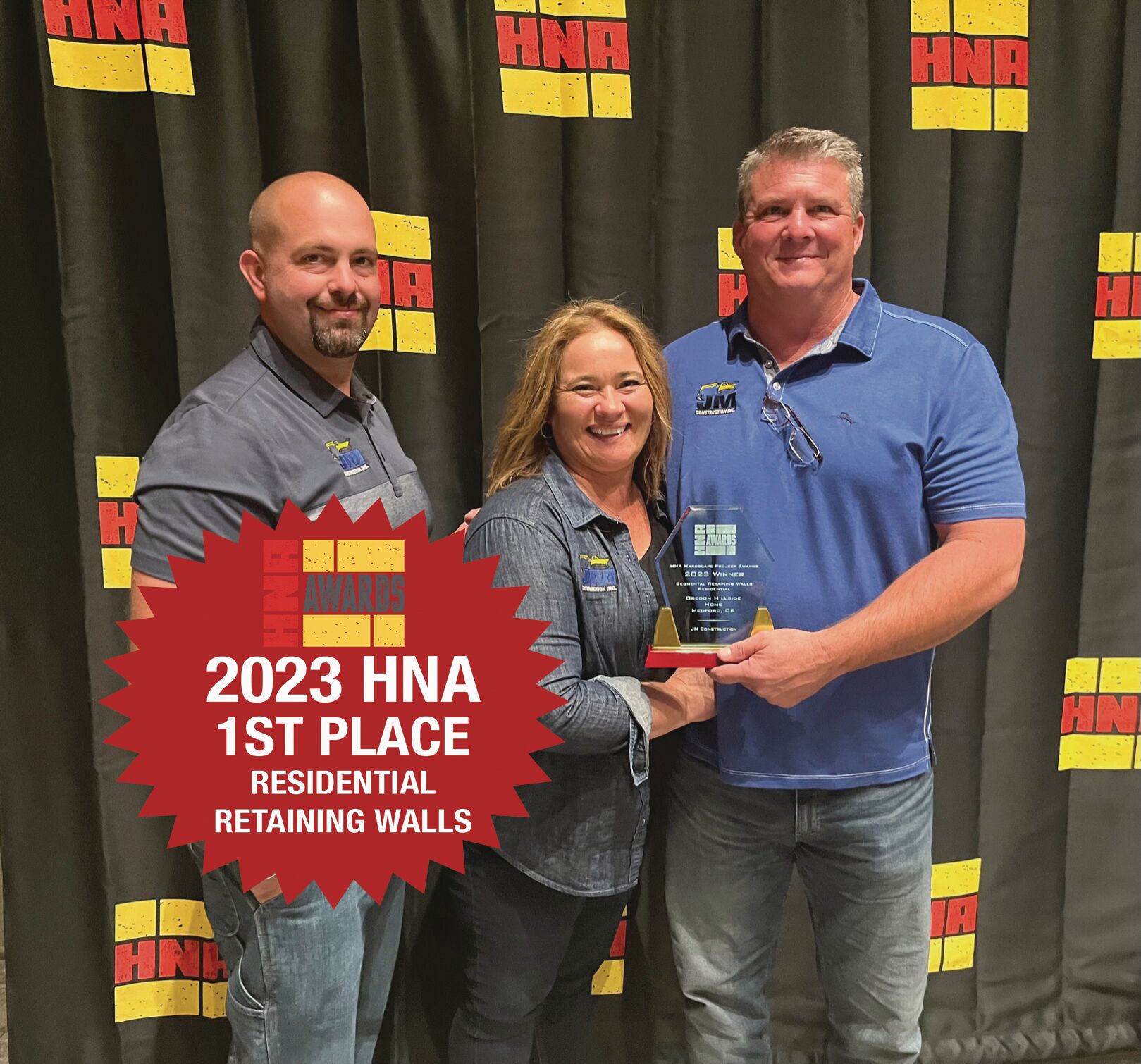 L to R: JM Construction representatives receiving the award: Joseph Eberhart, Deborah Myers (co-owner/administrator) and Jason Myers (owner/president). JM Construction representatives receiving the award.